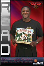 Dominique Wilkins Holding Book